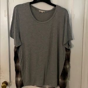 Shirt with plaid detail.